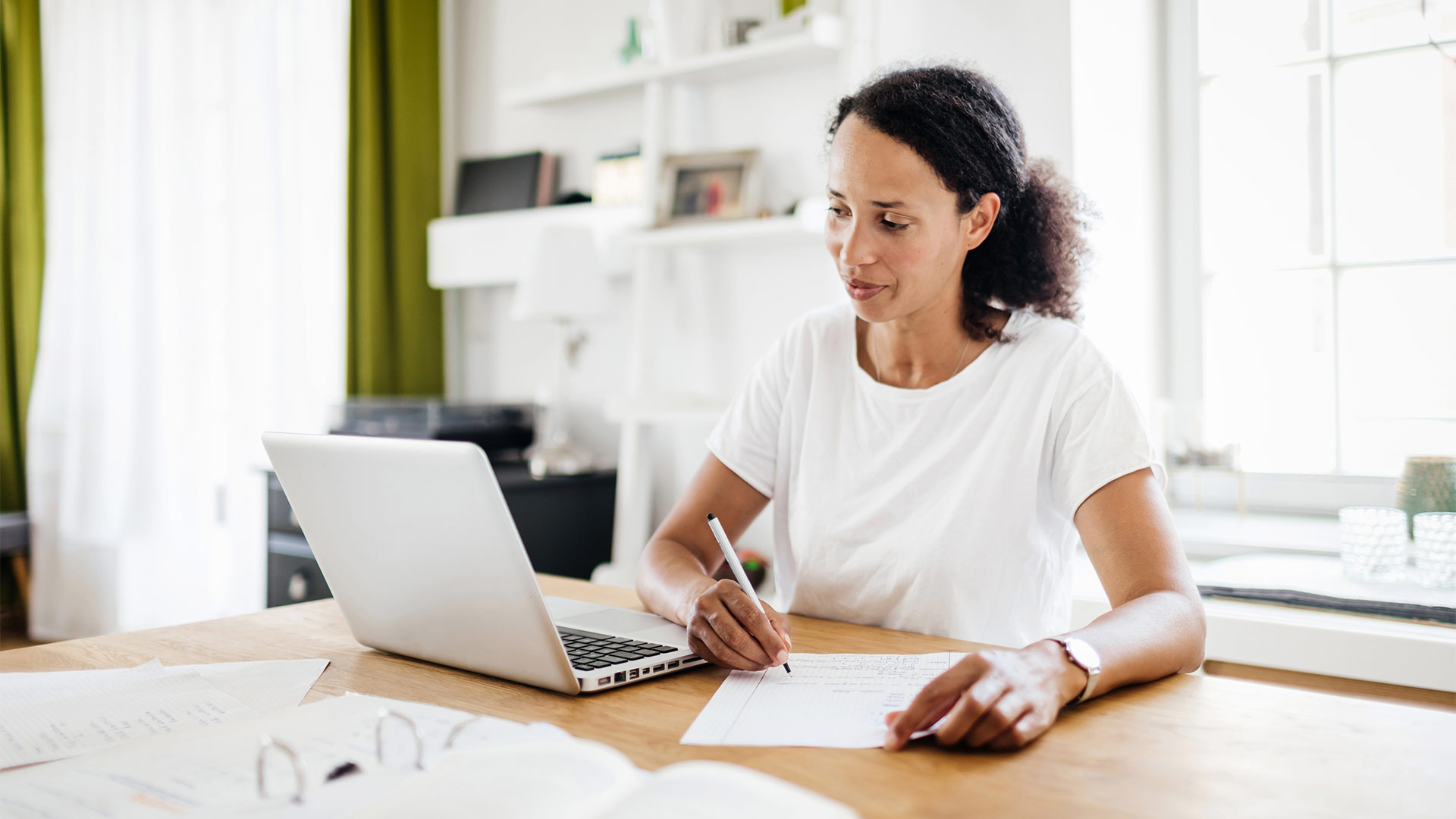 a woman working on her laptop