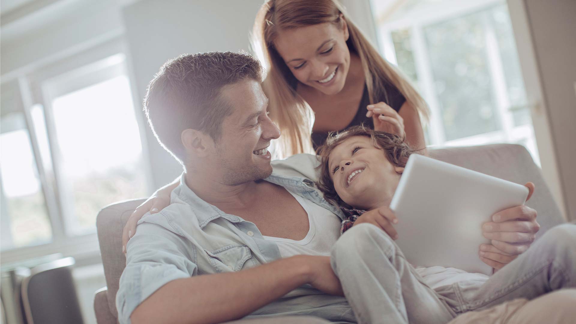 family playing in home living room