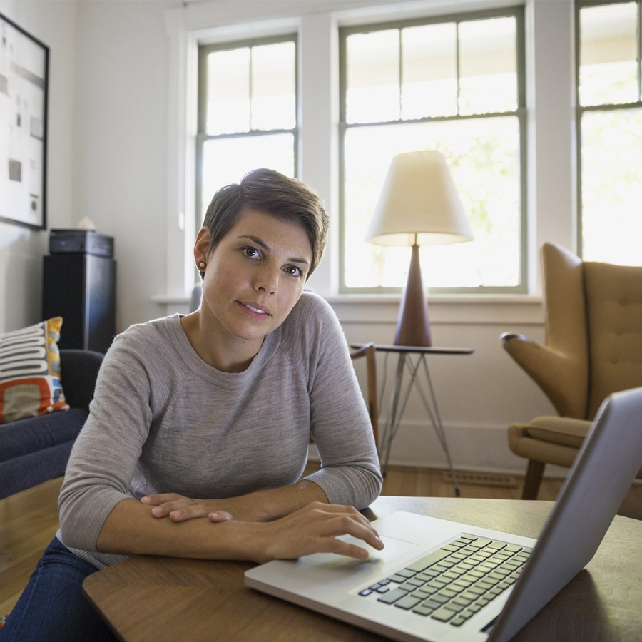 A woman working on her laptop